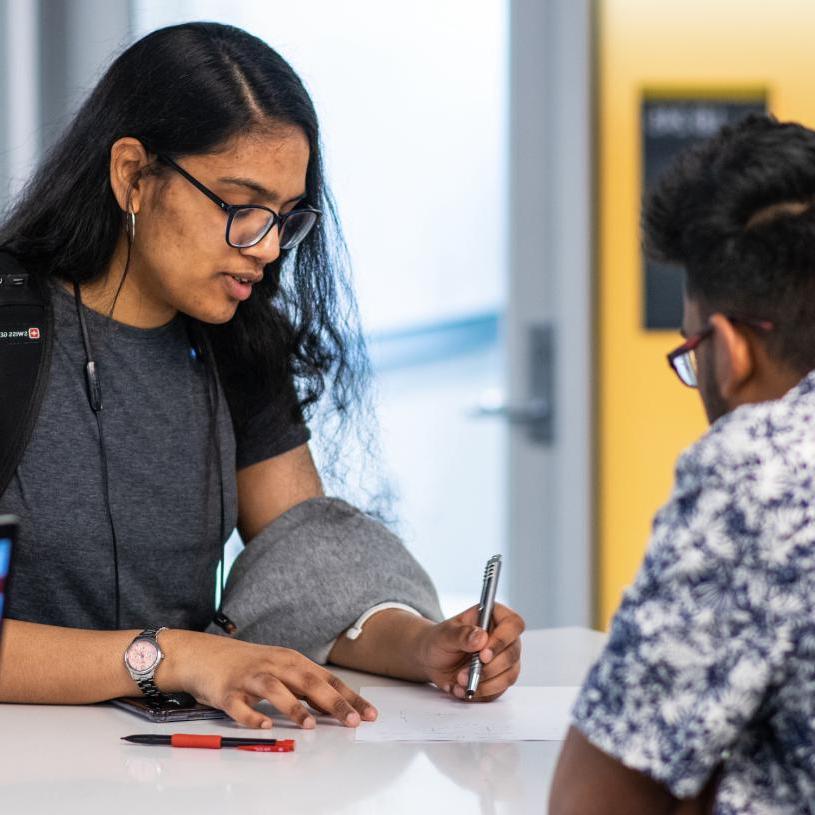 A student receiving assistance.